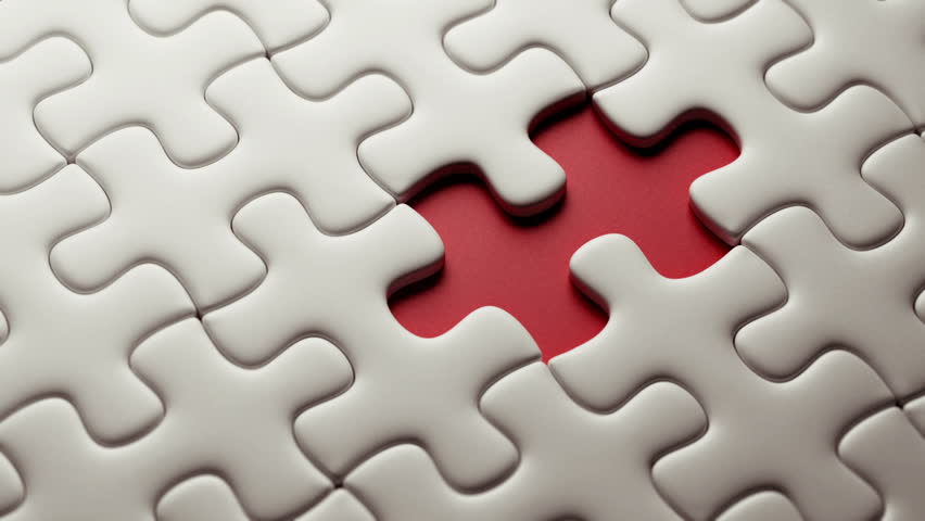 A white puzzle with a piece missing