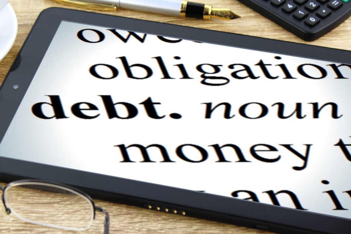 Image of tablet with definition for debt