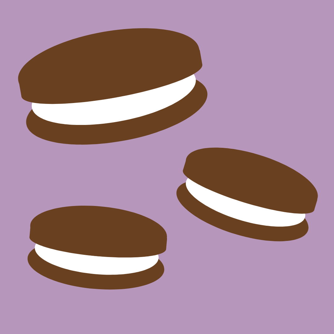 Chocolate Whoopie Pies with vanilla icing on a purple background
