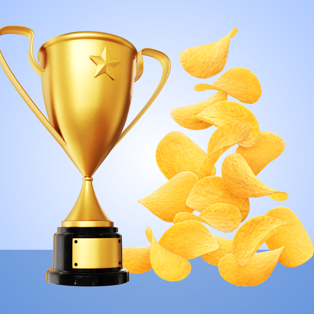 A trophy next to some potato chips