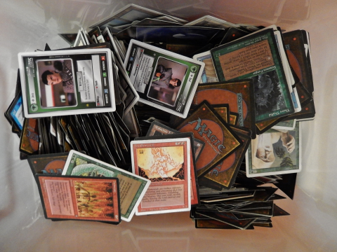 A box filled with cards from Magic the Gathering
